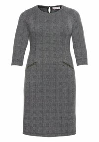 Robe à carreaux grise avec un col rond, des manches trois-quarts et des accents de fermeture éclair dorée sur les poches. Texture lisse, coupe ajustée.