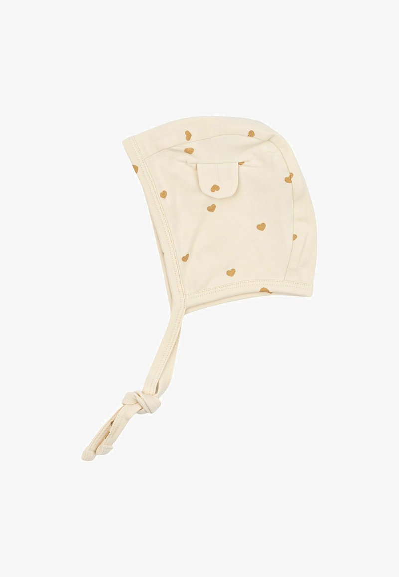 Gai brūns kokvilnas zīdaiņu cepure ar maziem zeltainiem sirds rakstiem, sānu atloku un regulējamiem saitēm drošai nostiprināšanai. Mīksta tekstūra.