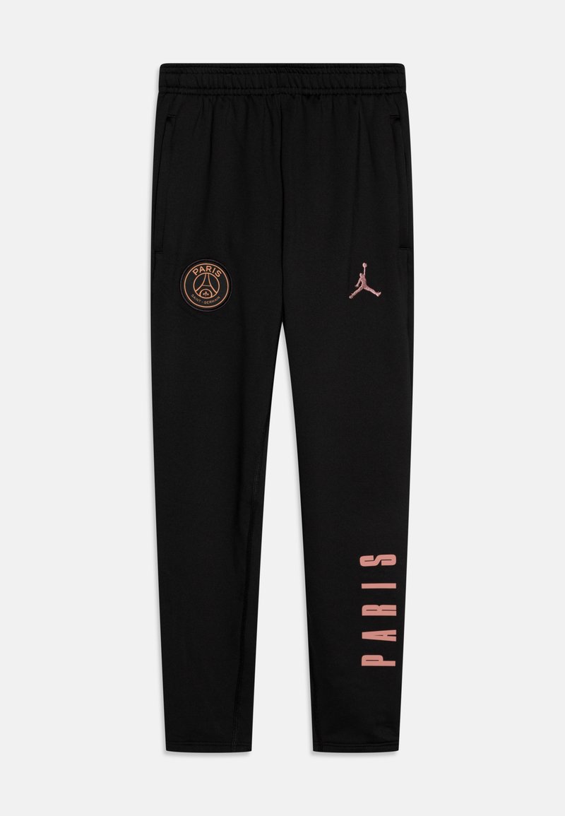 Pantalones deportivos negros con cinturilla elástica, presentan un emblema de París en bronce y un logo de Jordan en rosa, con el texto "PARÍS" en rosa en la pierna.