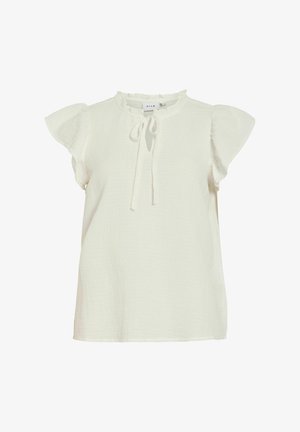 Blouse blanche à manches courtes avec col à volants et détail de nouage au niveau de l'encolure, en tissu léger texturé.