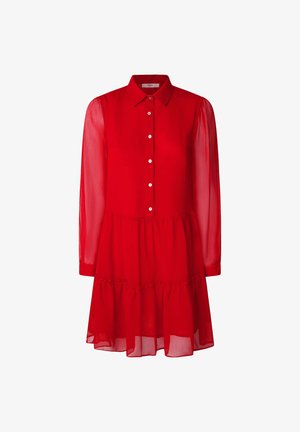 Punainen, pitkähihainen mekko, joka on valmistettu läpikuultavasta kankaasta. Mekossa on klassinen kaulus, nappilista ja kerroksellinen rypytyshelma.