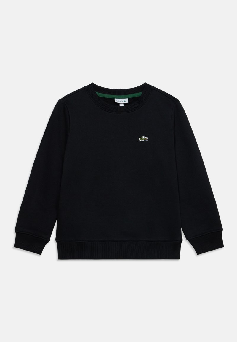 Sweat-shirt noir manches longues col rond avec poignets et ourlet côtelés, arborant un petit logo crocodile vert sur la poitrine gauche.