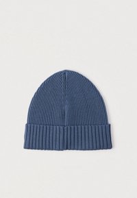 Căciulă tricotată, culoare albastru închis, textură în rețea, vârf rotund, bandă largă la margine, construcție fără cusături. Potrivită pentru purtat în vreme rece.