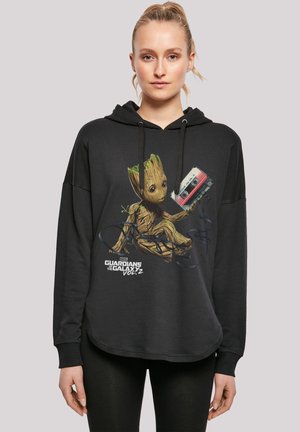 Black hoodie featuring an illustrated Groot character holding a cassette tape. The design includes "Guardians of the Galaxy Vol. 2" text.