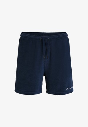 Donkerblauwe badstof shorts met een elastische tailleband, verstelbaar koord en klein wit logo aan de onderzijde rechts.