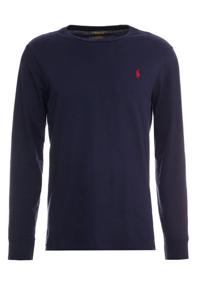 Navyblauwe lange mouw T-shirt van katoen met een ronde hals. Bevat een klein rood polo-logo op de linkerborst. Zachte textuur.