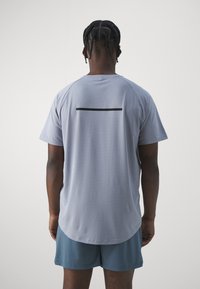ICANIWILL STRIDE RAGLAN - Camiseta deportiva - light blue