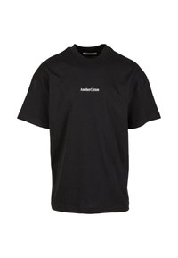 Sort bomulds t-shirt med afslappet pasform, rund halsudskæring, korte ærmer, og "AnotherCotton" logo trykt i hvidt på forsiden.