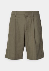 Shorts kaki realizzati in tessuto leggero, con fronte piatto, pieghe e tasche standard. Bordo pulito e texture smorzata.