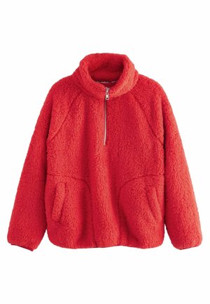 Pull-over en polaire rouge avec col montant, demi-fermeture éclair à l'avant, manches longues et deux poches avant. Tissu doux et texturé pour la chaleur.