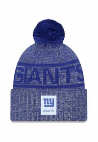 Blaue gestrickte Mütze mit einem flauschigen Pompon oben. Verfügt über ein strukturiertes Muster, das Logo "GIANTS" und ein Etikett mit "NY" und "NEW YORK GIANTS."