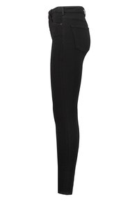 Vaqueros skinny negros de mezclilla. Con una cintura alta, bolsillos traseros y una silueta ceñida y estilizada. Textura suave.