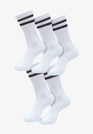 Biele bavlnené ponožky v crew štýle s dvoma čiernymi horizontálnymi pruhmi na vrchu. Majú rebrovanú textúru a zosilnenú pätu a špičku.
