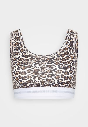Leopard print sports bra with wide straps and white elastic band at the bottom featuring "Copenhagen Studios" text.