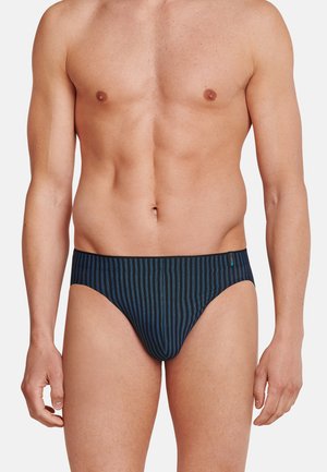 Herren Slips in Marineblau mit feinen vertikalen Streifen und einem glatten Stoff, ausgestattet mit einem schwarzen Bund. Keine sichtbaren Logos.