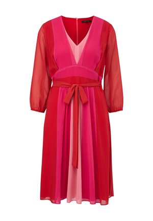Dress featuring a deep V-neck, sheer long sleeves, and a tie belt. Color-blocked design in shades of red and pink, with a smooth texture.