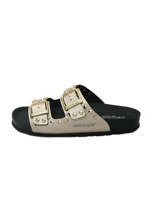 Sandali a due fibbie in pelle beige con borchie dorate e suola in gomma nera. Presentano cinturini regolabili per una vestibilità perfetta e il marchio GRÜNLAND.