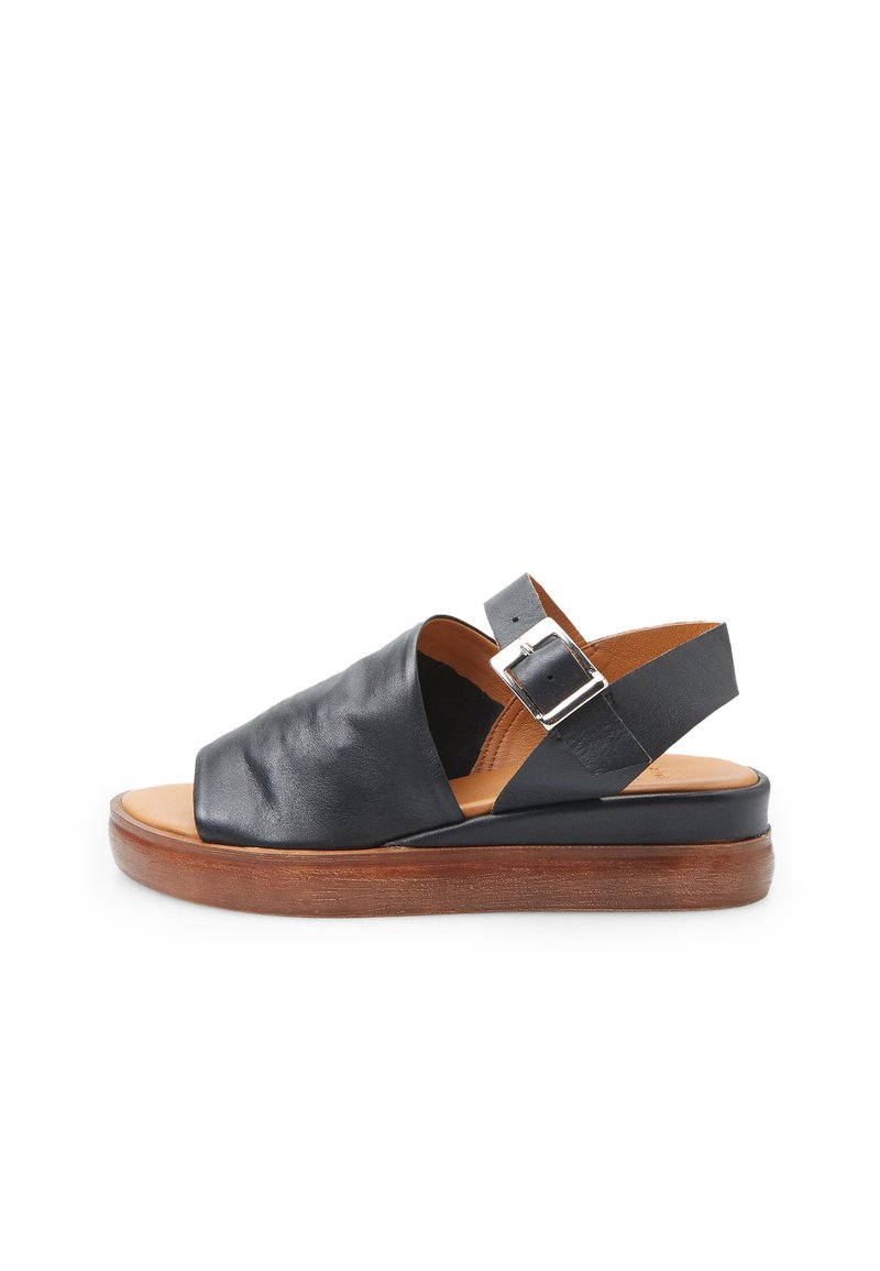 Black leather sandal with an open toe, wide front strap, and adjustable ankle strap. Wood-like platform sole with a smooth finish.