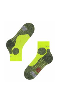 Neonowo żółte skarpetki do kostki z szarymi akcentami i teksturowanymi wzorami. Wykonane z prążkowanej tkaniny, wyposażone w strategiczne poduszki dla wsparcia.