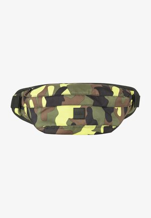 Camouflage fanny pack in green, brown, and yellow colors; made from durable fabric; features an adjustable strap and a zippered pocket.