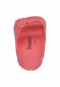 Pink rubber sandal featuring a textured footbed and a single strap with a buckle accent. The interior shows brand text with a smooth surface.