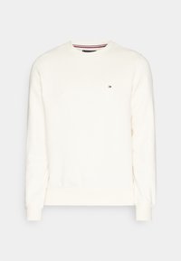 Sudadera blanca de algodón con cuello redondo, mangas largas, puños acanalados y un pequeño logo en el pecho. Textura suave y diseño minimalista.