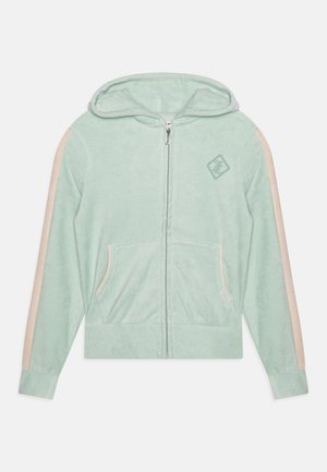 Sweat à capuche zippé vert menthe en matière douce, avec des bandes latérales beiges, des poches avant et une capuche ornée d'un petit logo.