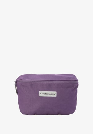 Purple zippered cosmetic bag with a small "Clepomanicx" label on the front, resting on a flat surface.