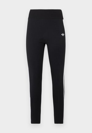 Sorte højtaljede trænings leggings med hvidt logo på hoften og tre hvide striber, der løber ned ad siderne.