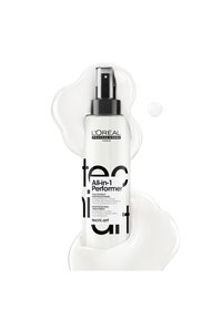 L'Oréal Professionnel All-in-1 Performer hair treatment spray bottle surrounded by smooth white liquid on white background.