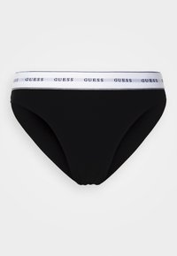 Fekete bikini alsó fehér elasztikus derékkal, sötétkék színű, ismétlődő 'GUESS' logóval. Simább anyagú, klasszikus szabású.
