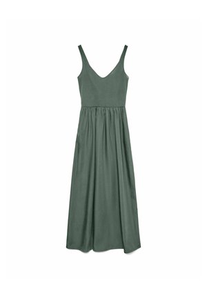 Zaļa, bez piedurknēm tērps ar V formas kakla izgriezumu, pieguļošs augšdaļa un sakrātas svārki. Izgatavota no mīksta, gluda auduma ar plūstošu dizainu.