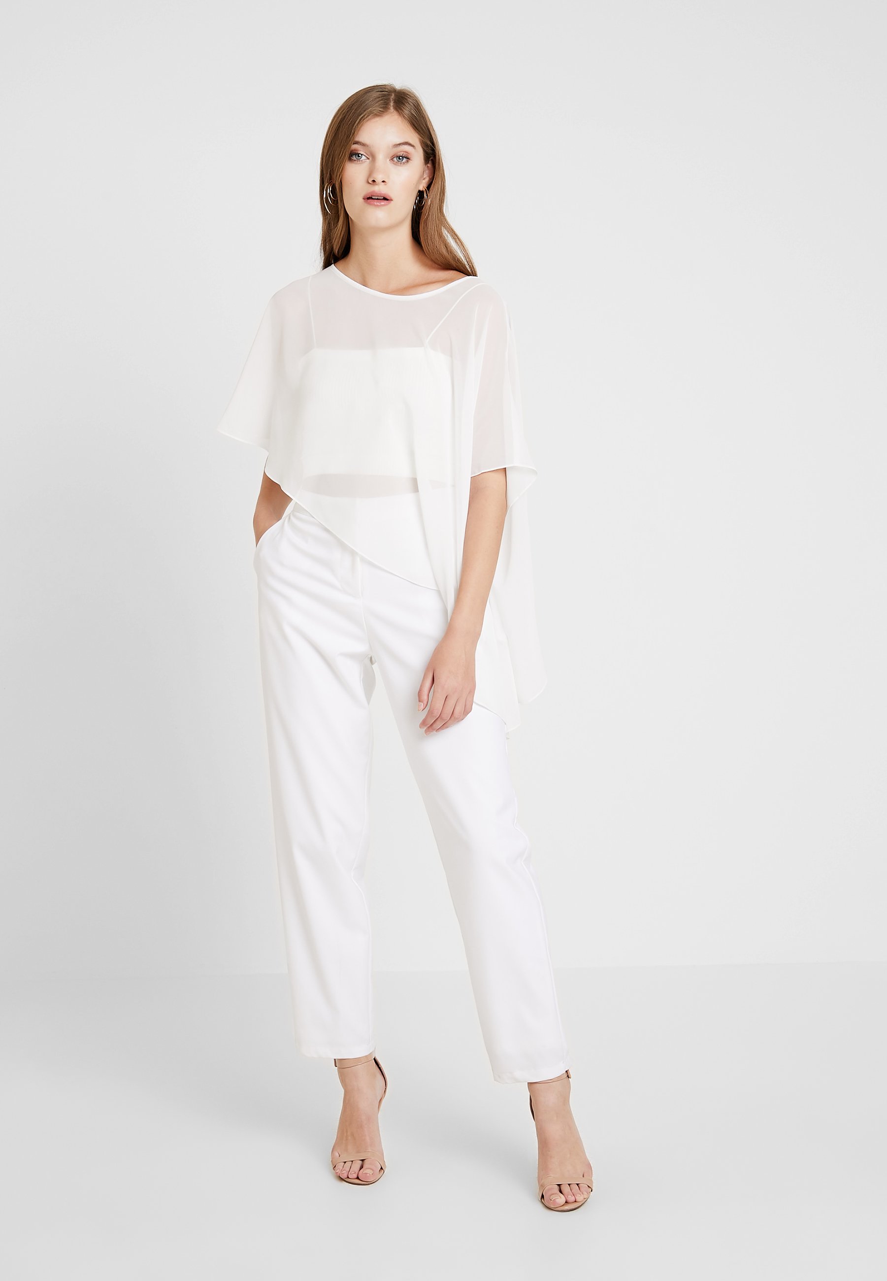 Swing Cape creme weiss Zalando.no Swing Cape - champagner