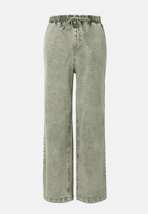 Pantalons large vert clair avec une taille à cordon de serrage, fabriqués à partir d'un tissu texturé. Présente des coutures sur les côtés et une coupe décontractée.