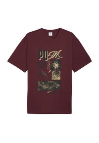 Maroon Puma T-shirt with gold and black graphic text and images, including "PUMA," a puma silhouette, and abstract patterns.