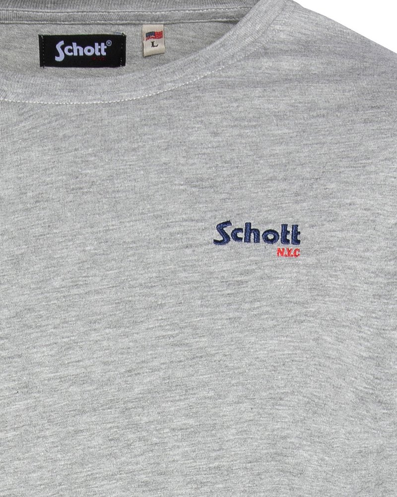 T-shirt girocollo grigio realizzato in cotone. Presenta il logo ricamato "Schott" in blu navale con accenti rossi. La tag indica la taglia Large.