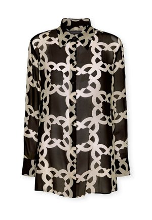 Blusa nera trasparente con un motivo geometrico a catena bianca, maniche lunghe, colletto e chiusura con bottoni. Tessuto morbido e leggero.