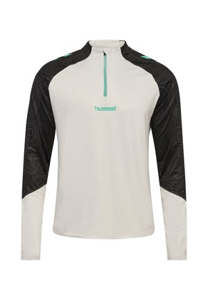 Maglia sportiva bianca a maniche lunghe con spalle e maniche nere con motivo, cerniera frontale e logo hummel turchese sul petto.