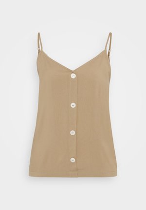 Μπεζ καμισόλ με λεπτές ρυθμιζόμενες τιράντες, V-σχηματιστό ντεκολτέ και κλείσιμο με κουμπιά μπροστά που περιλαμβάνει πέντε λευκά κουμπιά στη μέση.