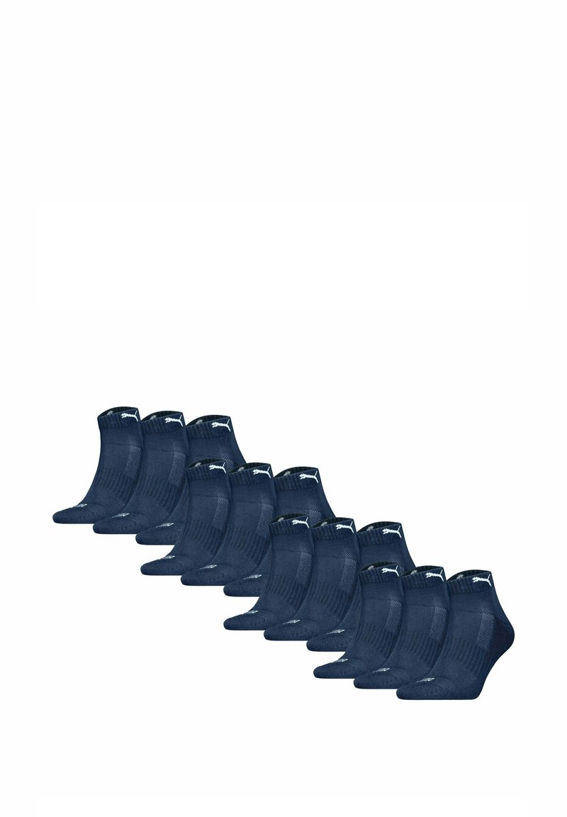 Confezione di calzini alla caviglia blu navy con texture a costine, tallone rinforzato e logo. Dodici paia disposti in fila.