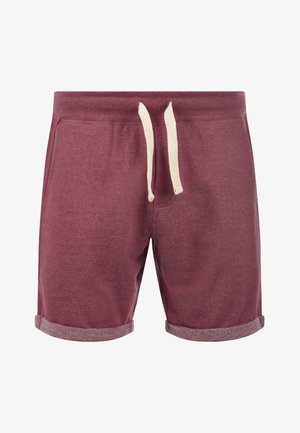 Bordeaux bomullsshorts med snøring i midjen, rullet kant og melert tekstur. Enkelt, avslappet design som passer for ulike aktiviteter.
