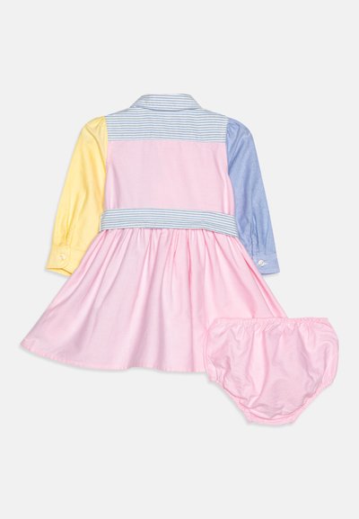 Colorful dress featuring long sleeves in yellow, blue, and striped accents, with a pink skirt and matching bloomers made of soft fabric.