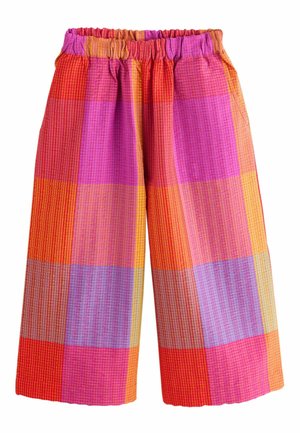 Wide-leg pants with elastic waistband, featuring large colorful plaid pattern in red, pink, orange, purple, and yellow shades.