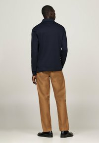 Tommy Hilfiger REGULAR LONG SLEEVE  - Poloshirt - desert sky