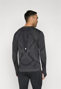 ASICS ROAD WINTER SEAMLESS TOP - Top s dlhým rukávom - performance black