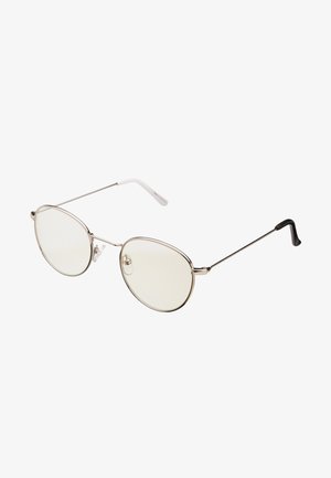 Gafas de sol metálicas con lentes ovalados, montura plateada y varillas finas negras. Los lentes son de color claro, proporcionando un aspecto de estilo vintage.