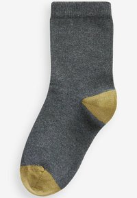 Chaussette en coton gris foncé avec une texture côtelée, ornée d'accents dorés au niveau des orteils et du talon. Longueur mi-mollet avec des coutures renforcées.
