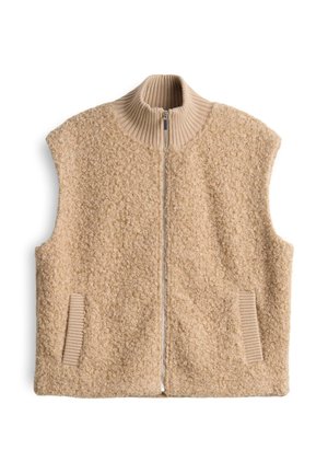 Gilet sans manches beige en matériau texturé et duveteux. Col montant avec une fermeture éclair complète, présentant des accents en tricot côtelé au col et aux poches.