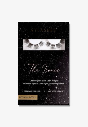 Black packaging with speckled design features two sets of faux mink lash segments. Text includes product details in gold and pink lettering.