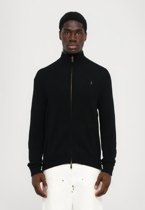 Black zip-up sweater with a mock neck design, ribbed cuffs, and hem. Features a small logo on the left chest in contrasting color.